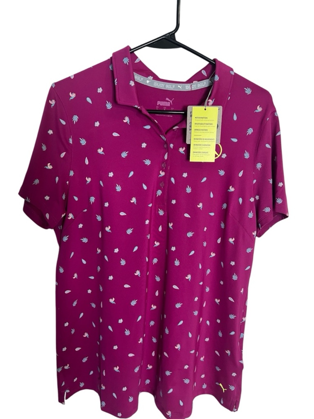 Puma Women’s Fuchsia NWT Polo  Size Large with Mercedes Benz Fancy Logo on it